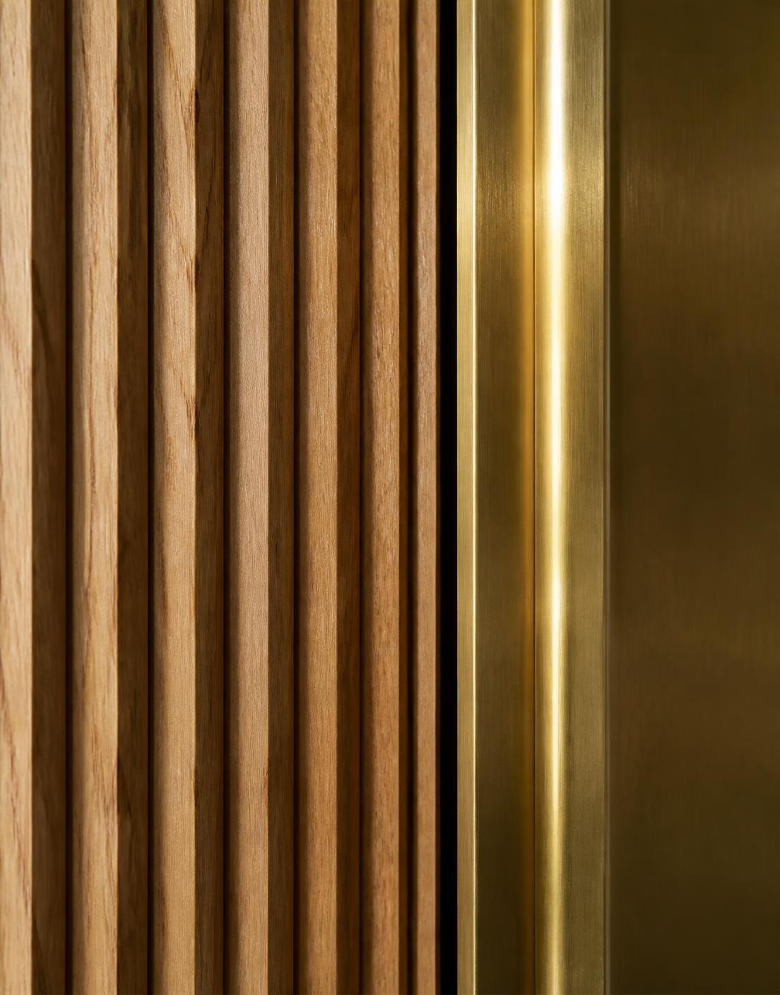 Fluted Oak & Brass Detail interior detail